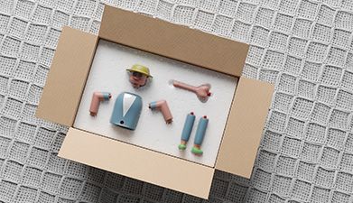 Eine Steck-Figur zum zusammenbauen in einem Karton