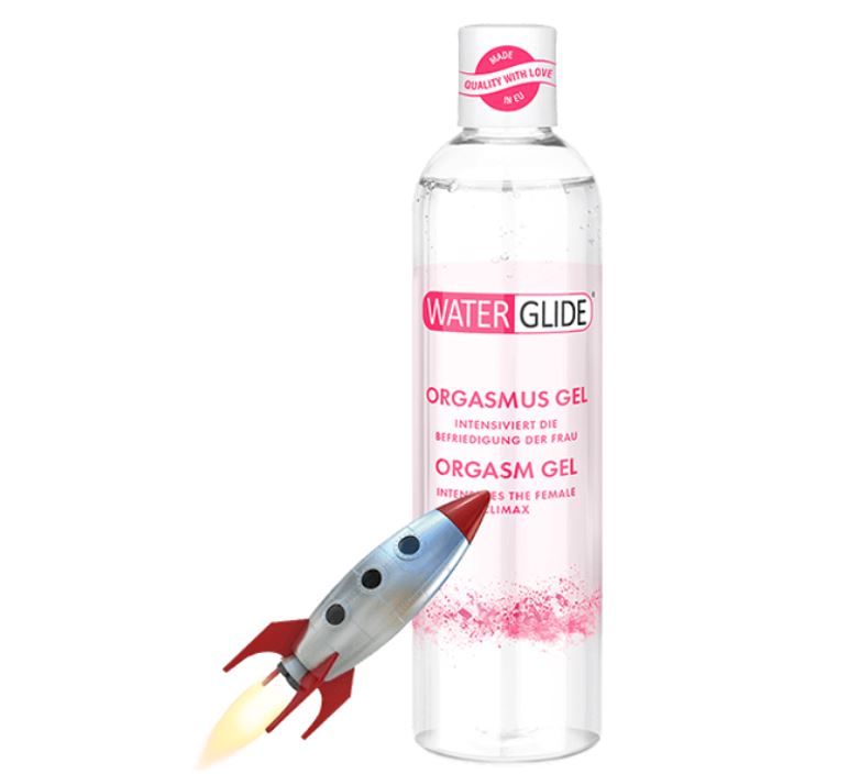 Das stimulierende Orgasmus Gel von Waterglide mit einer kleinen Rakete davor und vor einem weißen Hintergrund